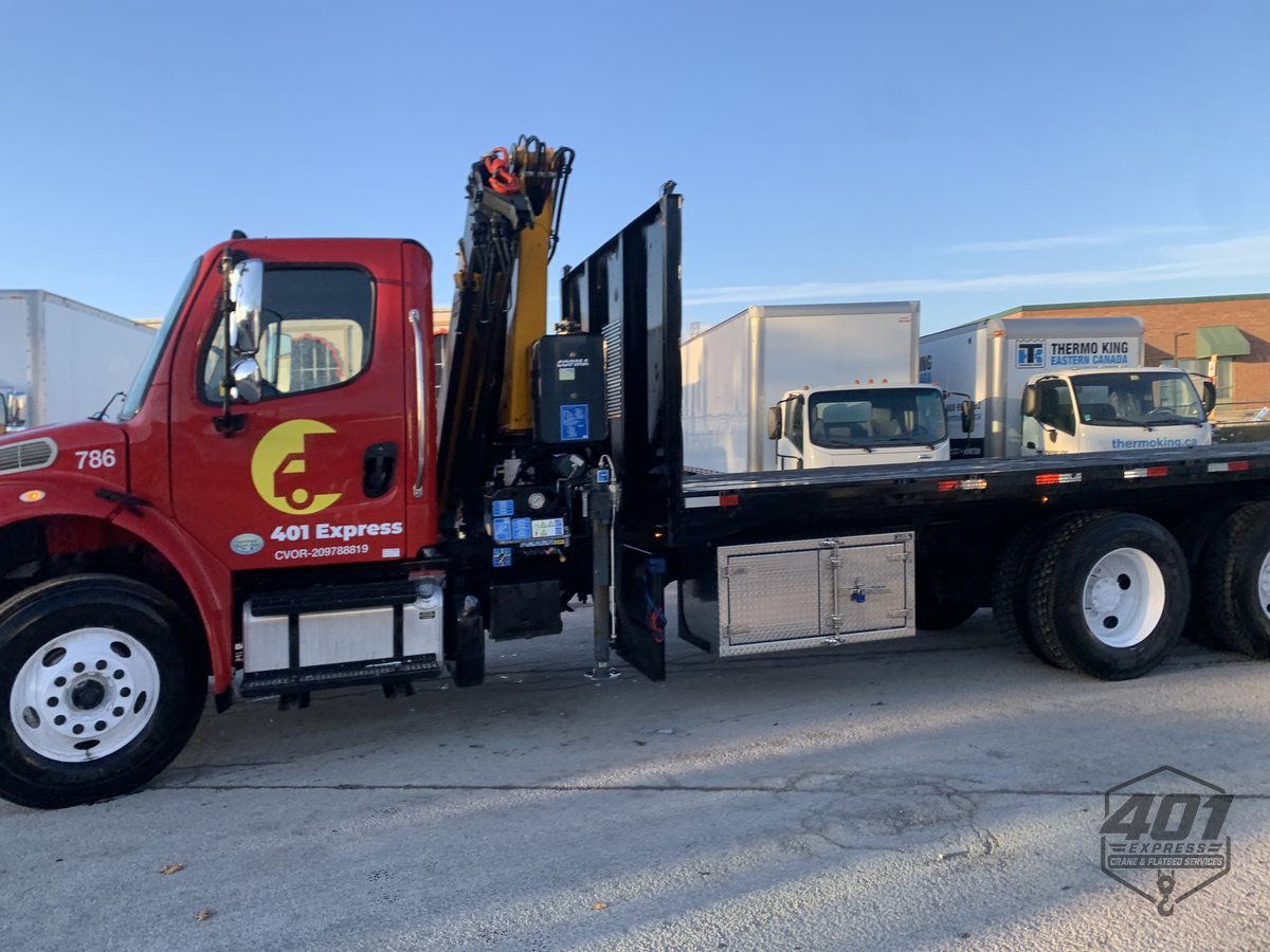 The 401 Express crane truck and flatbed ready for dispatch across the Greater Toronto Area