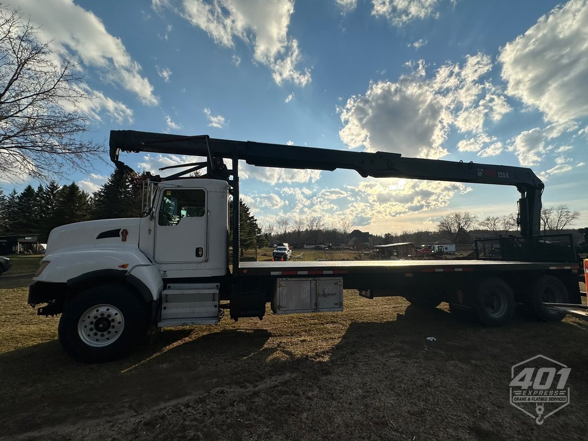The 401 Express flatbed crane truck, used for transporting regulated dangerous goods across the GTA